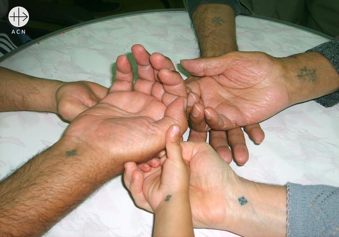 Coptic people decided to brand themselves as they felt like. This is why every Coptic, old and young alike, have a cross tattooed on their wrist, where Jesus had the nail prints.