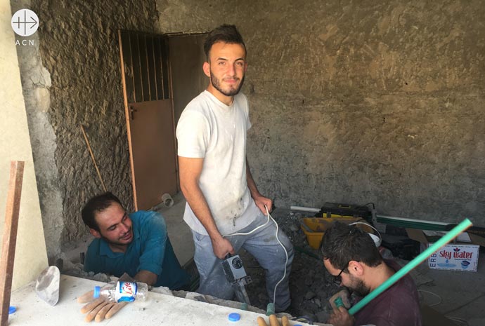 Christians reconstructing their houses in Qaraqosh damaged by ISIS