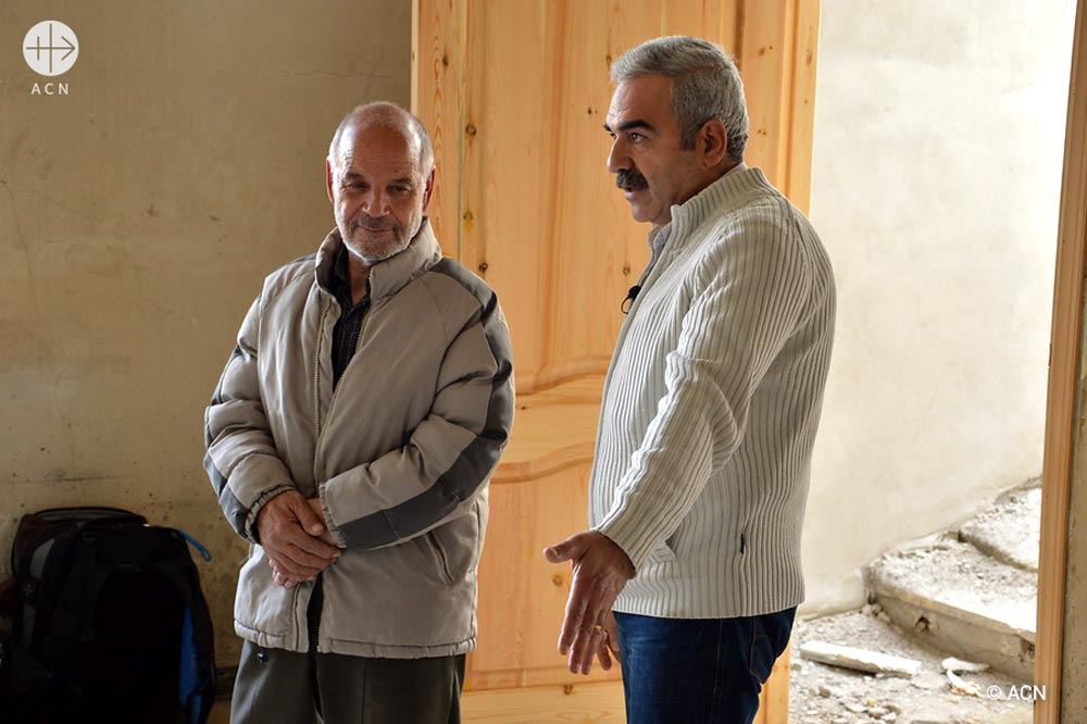 Elias and the engineer Hassib Makhoul, visiting the reconstruction works
