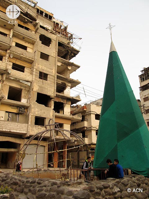 Streets of Homs. Christmas tree in Christian neighbourhood.