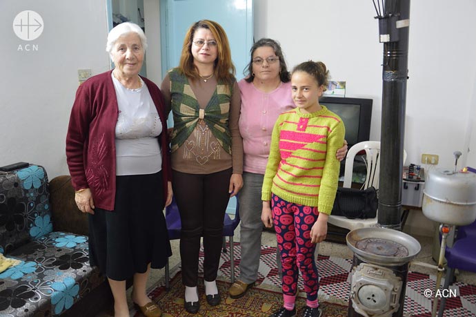 Houdaib Family in their just rebuilt house in Homs.