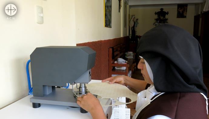 A new host baking machine for the discalced Carmelite Sisters in Abancay, Peru