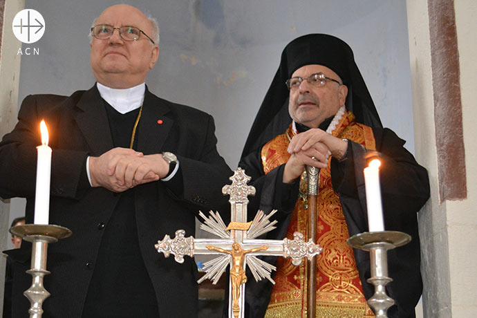 Father Andrzej Halemba (ACN Middle East Projects Coordinator) and Greek Catholic Melkite Archbishop Nicolas Sawaf of Lattakia.