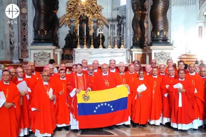 The Venezuelan bishops during ad limina visit to Rome: Group photo of the bishops with the venezulean flag at St. Peters Basilica in Rome. 