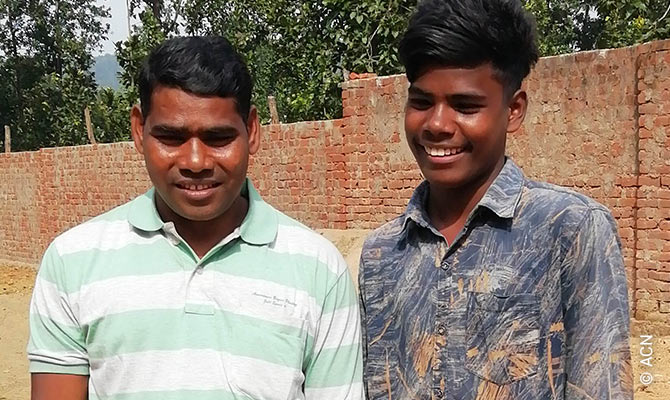 Bhsakar Sunamajhi (43) with his son Daud.