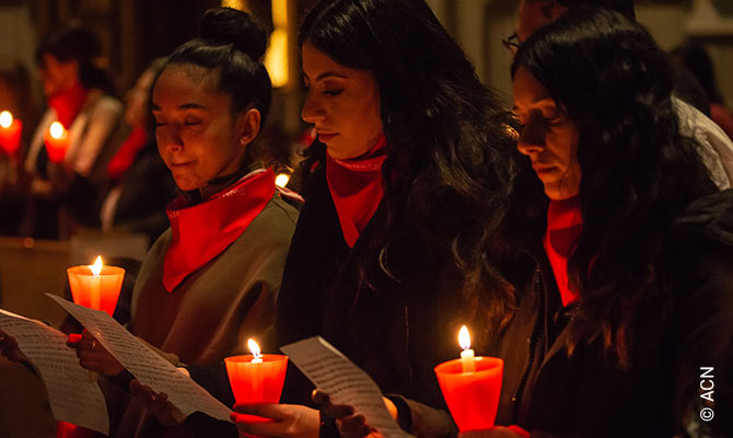 Red Wednesday in St. Michael's Cathedral in Toronto, Canada. Three young Chaldeans helped with a Aramaic hymn to honour Christian martyrs at the annual Red Mass sponsored by Aid to the Church in Need.