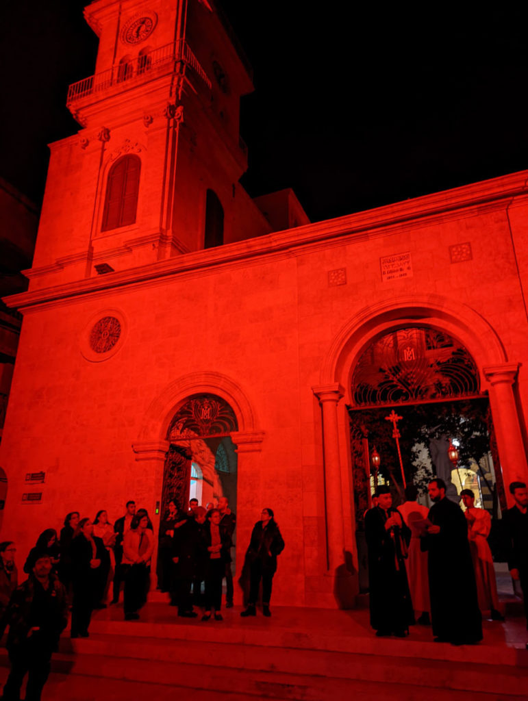 The Saint Elijah Maronite Cathedral in Aleppo illuminated in red during the 2021 Red Week.