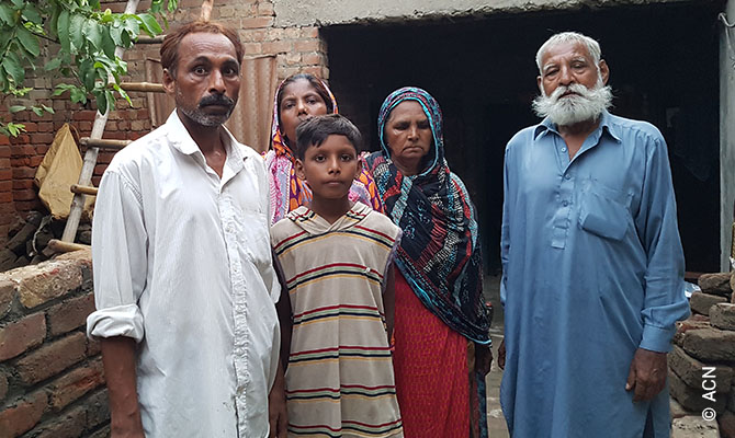 Amjad Arif, a Pakistani Catholic released after five years in prison for murder he didn't committed, with his family. He is one of 40 former prisoners and their families and friends after a Mass in Lahore’s Sacred Heart Cathedral to mark their release celebrated by Archbishop Sebastian Shaw. They have been released from prison on January 29 2020.