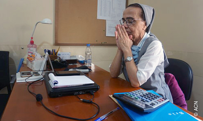 Lebanon: Sister Marie Justine el Osta, from the Maronite Sisters of the Holy Family, who serves as director of the dispensary in her office.
