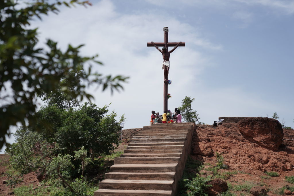 Church in Burkina Faso: pilgrims at a shrine in Ouagadougou
