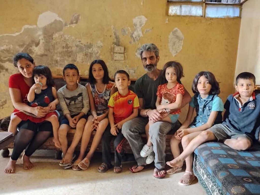 Familia muy pobre de Kashkoul (Damasco), que se beneficia de la ayuda de AIN.