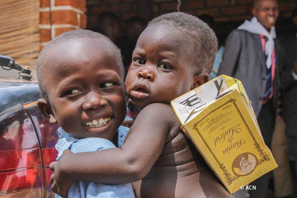 Children from the St Joseph Mukasa camp for displaced persons near the parish church