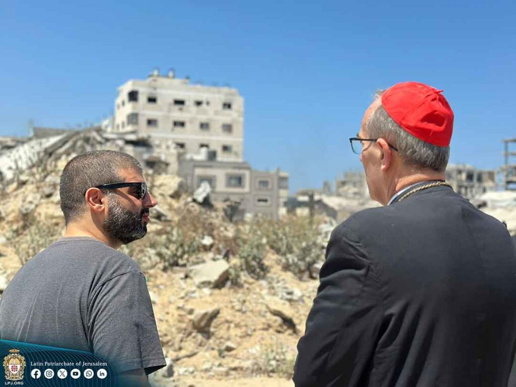  Patriarch Pierbattista Pizzaballa surveys the destruction caused by the Israeli attack on the parish in Gaza
