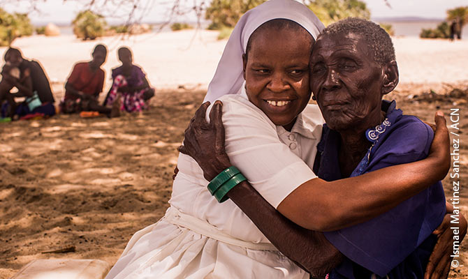 Sister Agnes admiring an elderly woman for her joyful existence despite the hard conditions in the Turkana region.