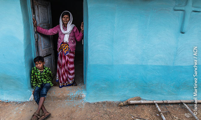 A mother and her son at the chapel of a remote Catholic mission parish in the state of Jharkhand.