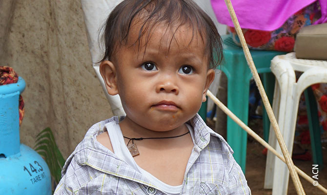 A refugee child in a Christian refugee camp after the terrible siege of Marawi.