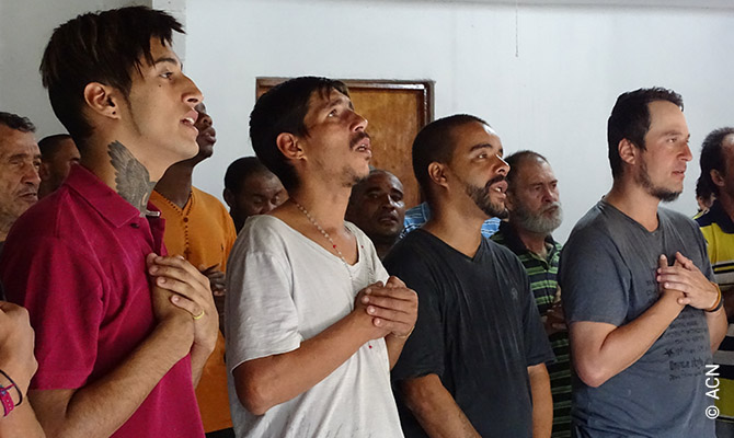 Former homeless people from Balca praying in Sao Paulo.